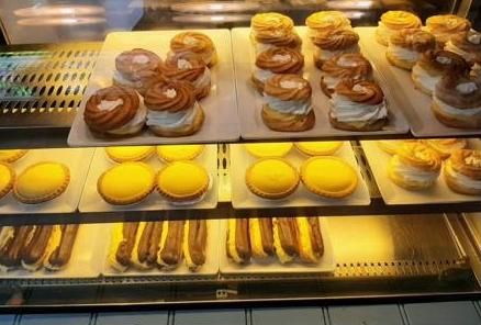 Fresh pastries and tarts in the cabinet